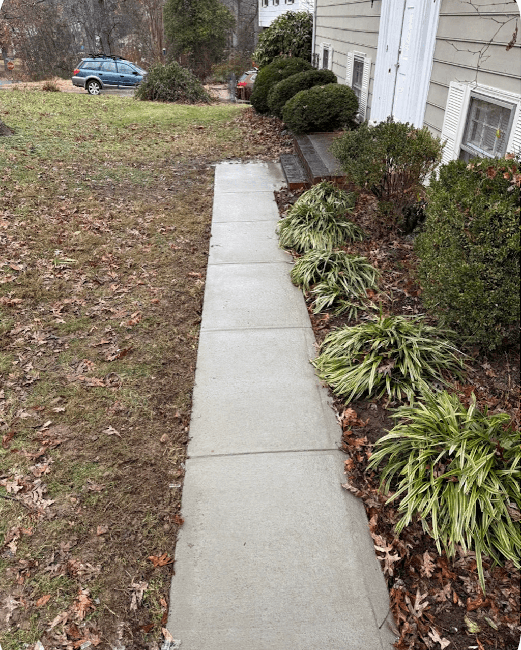 New concrete sidewalk with professional finish